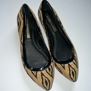 BCBGeneration tan and black print leather flats. Size 7.5
